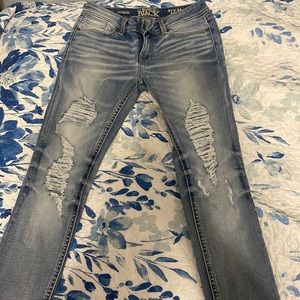 Buckle Black Skinny Ripped Jeans